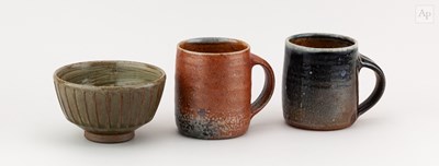 Lot 373 - Maze Hill Pottery; a near pair of stoneware...