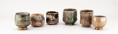 Lot 689 - A group of stoneware yunomi and cups by Mark...