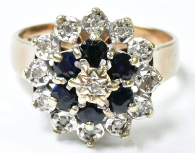 Lot 750 - A 9ct yellow gold sapphire and diamond floral...