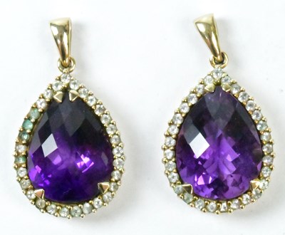 Lot 805 - A pair of 9ct yellow gold pear-shaped pendants,...