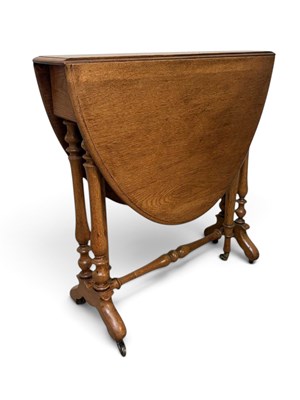 Lot 65 - A Victorian light oak Sutherland table, on...