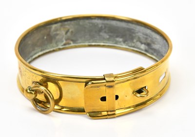 Lot 308 - A 19th century brass dog collar, diameter 15cm