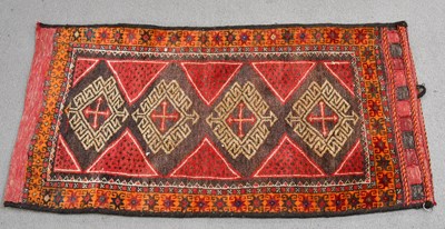 Lot 189 - An Eastern saddle bag, with stylised lozenge...