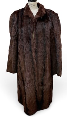 Lot 664 - A vintage lady's brown mink fur coat, with...