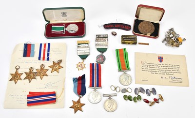 Lot 1218 - A collection of WWII medals including the...