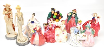 Lot 1279 - ROYAL DOULTON; nine figures comprising...