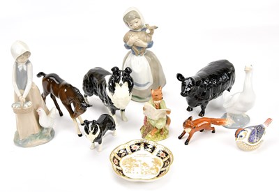 Lot 1296 - A collection of figures comprising three Nao...