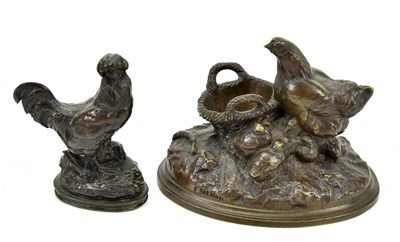 Lot 442 - A lead filled bronze figure of a cockerel,...