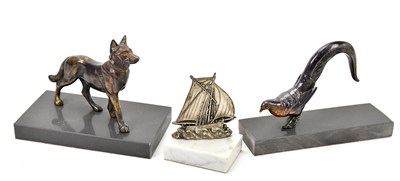 Lot 443 - A group of three Art Deco base metal figures...
