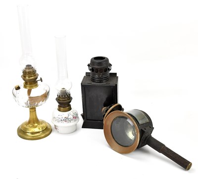 Lot 480 - A brass oil lamp with glass reservoir, height...