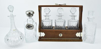 Lot 182 - A modern three-decanter oak framed tantalus,...