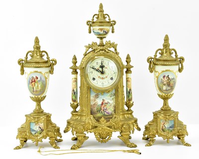 Lot 73 - A modern reproduction porcelain and brass...