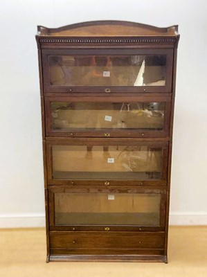 Lot 582 - HARRIS LEBUS; a four sectioned glazed stacking...