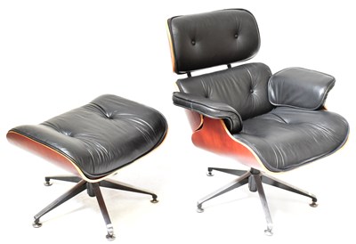 Lot 1 - AFTER CHARLES & RAY EAMES; a lounge chair and...