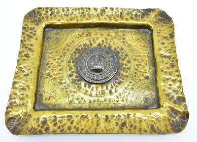 Lot 599 - An unusual military hand beaten brass trench...