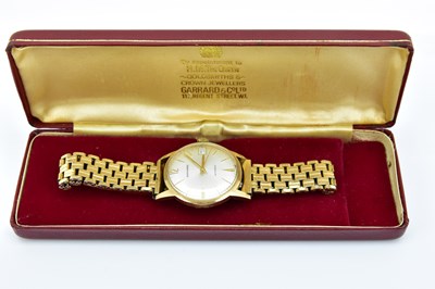 Lot 859 - GARRARD; a gentleman's 9ct gold automatic...
