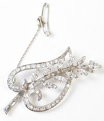 Lot 787 - A white metal brooch in the form of a leaf and...