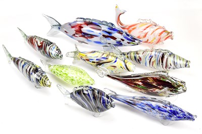 Lot 1434 - A collection of ten Murano glass fish, the...