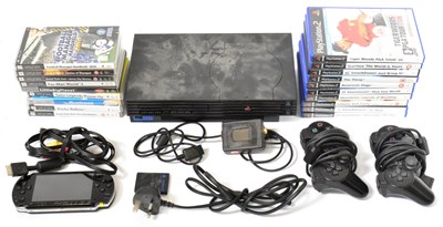 Lot 202 - A Sony PlayStation 2, with games to include...
