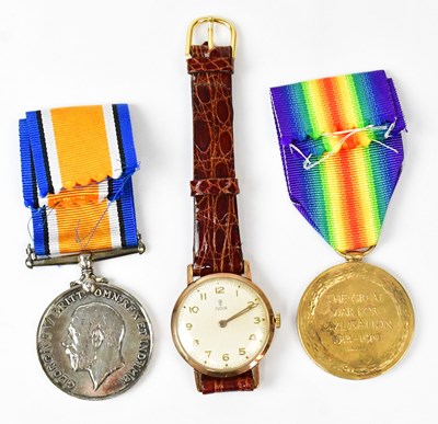 Lot 857 - TUDOR; a yellow metal wristwatch, the dial set...