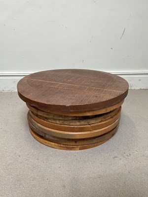 Lot 172 - Nine oak and hardwood circular table tops...