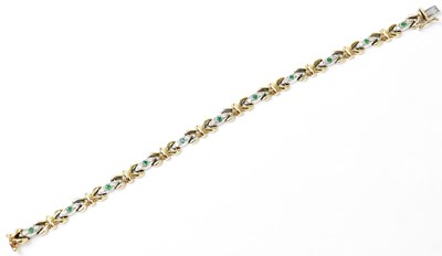 Lot 773 - A 9ct gold fancy link bracelet set with...