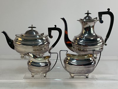 Lot 537 - WALKER & HALL; an Edwardian silver plated four...