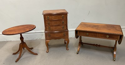 Lot 79 - A reproduction walnut serpentine chest with...