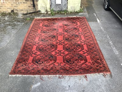 Lot 182 - A red ground Eastern style hand knotted carpet...