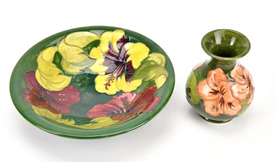 Lot 1389 - MOORCROFT; a 'Hibiscus' pattern vase, height...