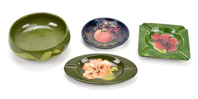 Lot 1390 - MOORCROFT; two 'Hibiscus' pattern ashtrays, a '...