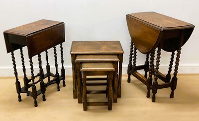 Lot 675 - An oak nest of three tables, height 49cm,...