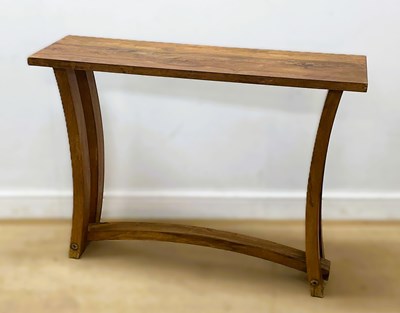 Lot 619 - A modern knotted pine hall table with arched...