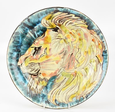 Lot 337 - POOLE STUDIO; an early ceramic plate decorated...