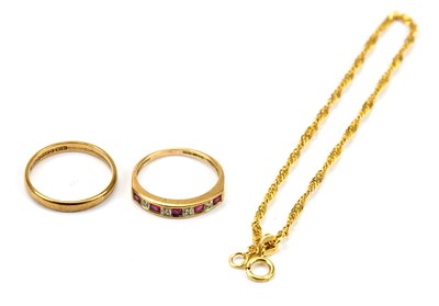 Lot 579 - A 9ct yellow gold ring set with diamond and...