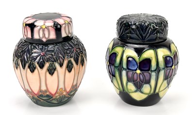 Lot 1336 - MOORCROFT; a 'Cluny' pattern lidded jar,...