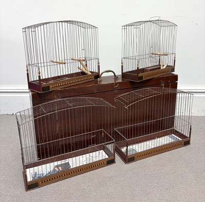 Lot 318 - A set of four early 20th century bird cages,...