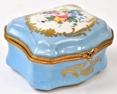 Lot 147 - SÈVRES; a porcelain music box, decorated with...