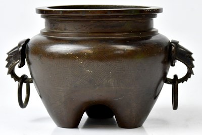 Lot 171 - A Chinese bronze censer with elephant mask and...