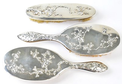 Lot 702 - LUEN WO; a pair of Chinese silver-backed...