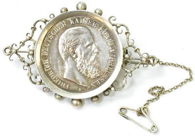 Lot 785 - A Prussian silver five- mark coin 1888,...