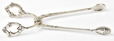 Lot 704 - CARL M. COHR; a pair of 830 grade silver sugar...