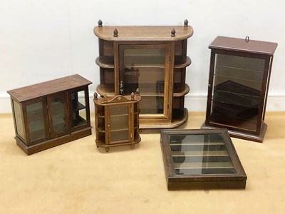 Lot 622 - Five various stained wooden glazed display...
