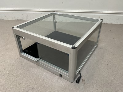 Lot 12 - A modern counter/pedestal top display cabinet,...