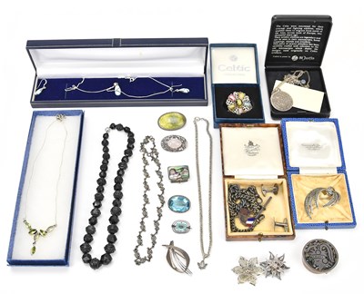 Lot 606 - A collection of white metal and costume...
