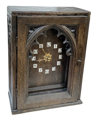 Lot 215 - A late 19th/early 20th century carved oak...