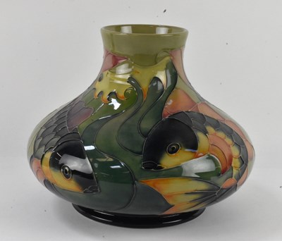 Lot 742 - SALLY TUFFIN FOR MOORCROFT; a squat vase...
