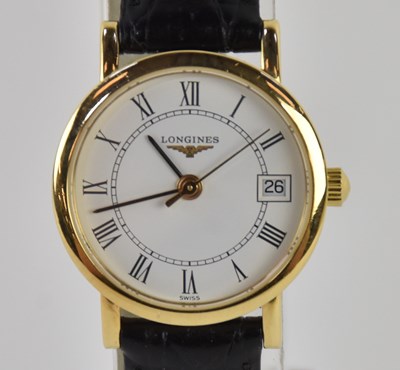 Lot 1794 - LONGINES; an 18ct yellow gold lady's...