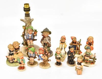 Lot 1401 - GOEBEL; a Hummel table lamp of a boy with...