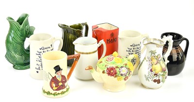 Lot 1357 - A collection of decorative ceramic jugs,...